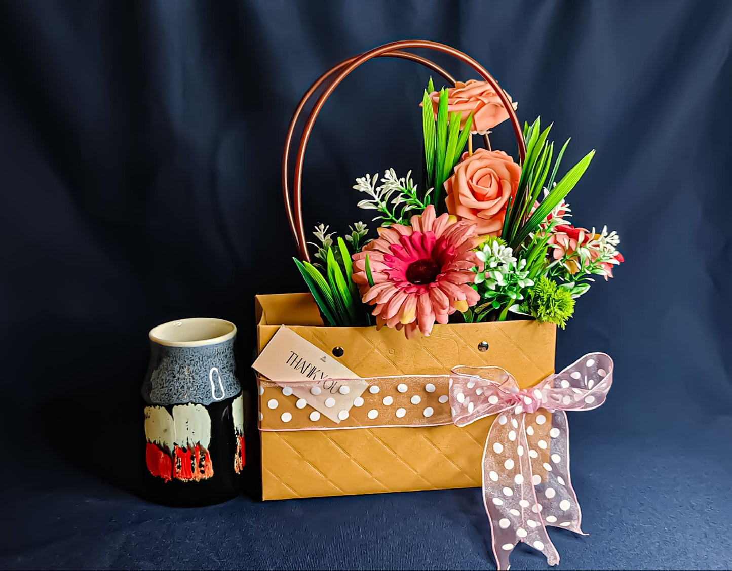 Buy Floral Gift Bouquet with Coffee Mug – Premium Leather-Finished Bag Gift