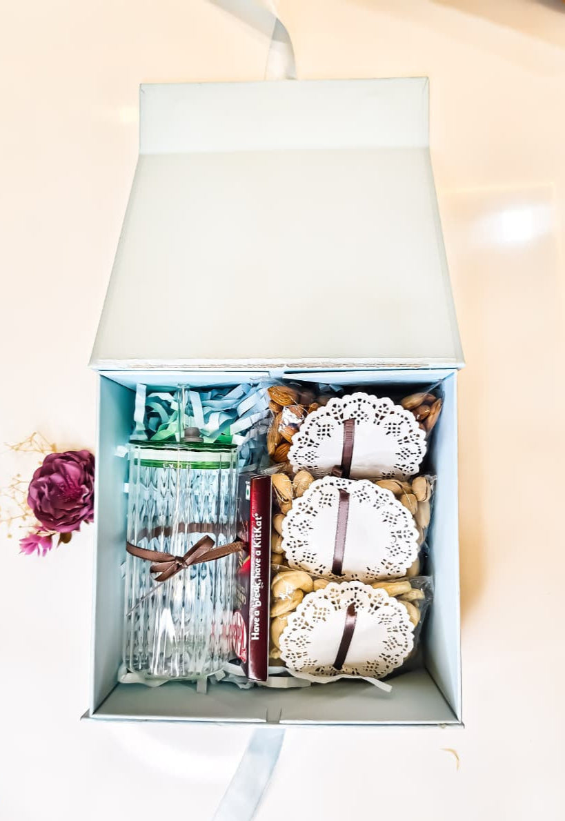 Buy Powder Blue Cardboard Gift Box with Dry Fruits, Chocolates & Glass Sipper – Luxury Hamper by SPARSH